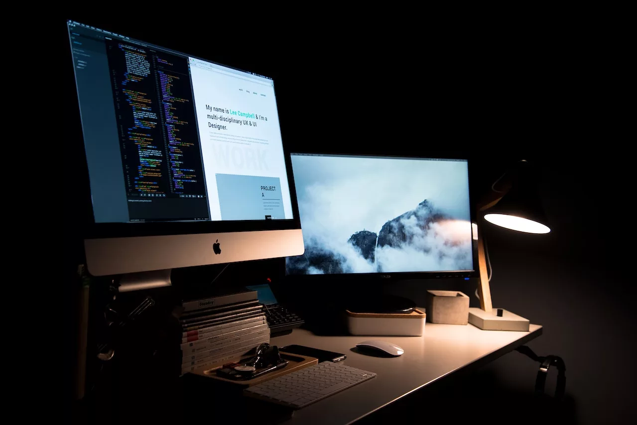 How can I clean the screen of my iMac?